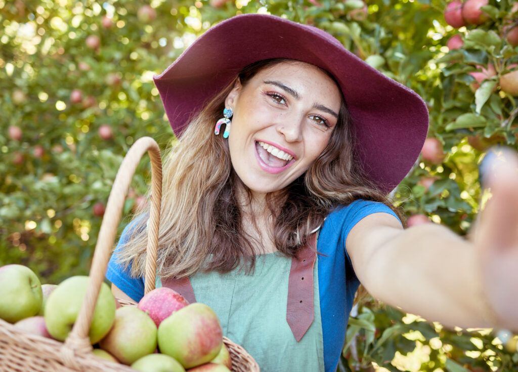 Portrait of one happy woman taking selfies